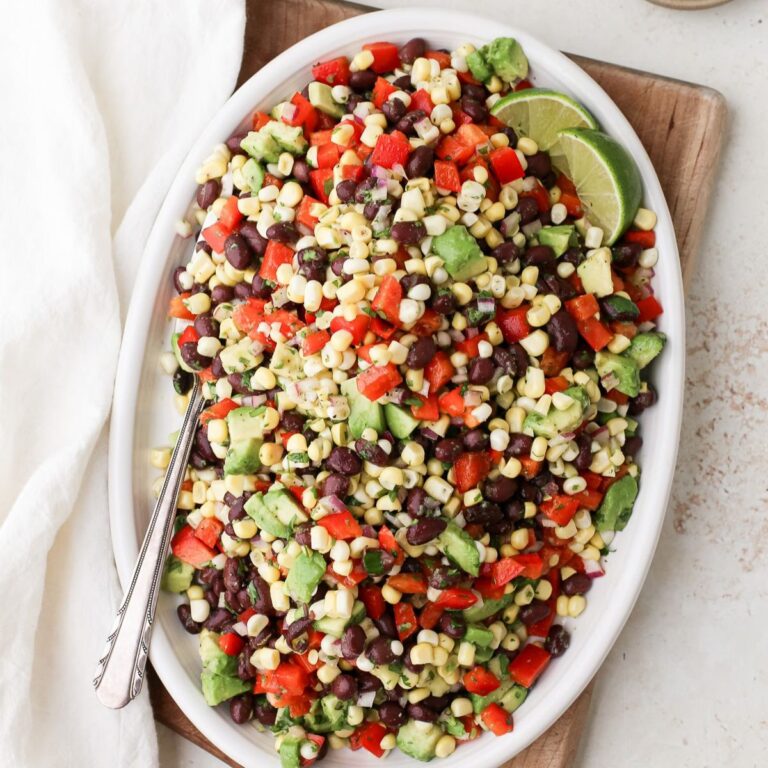 Corn and black bean salad with avocado and a zesty lime dressing.