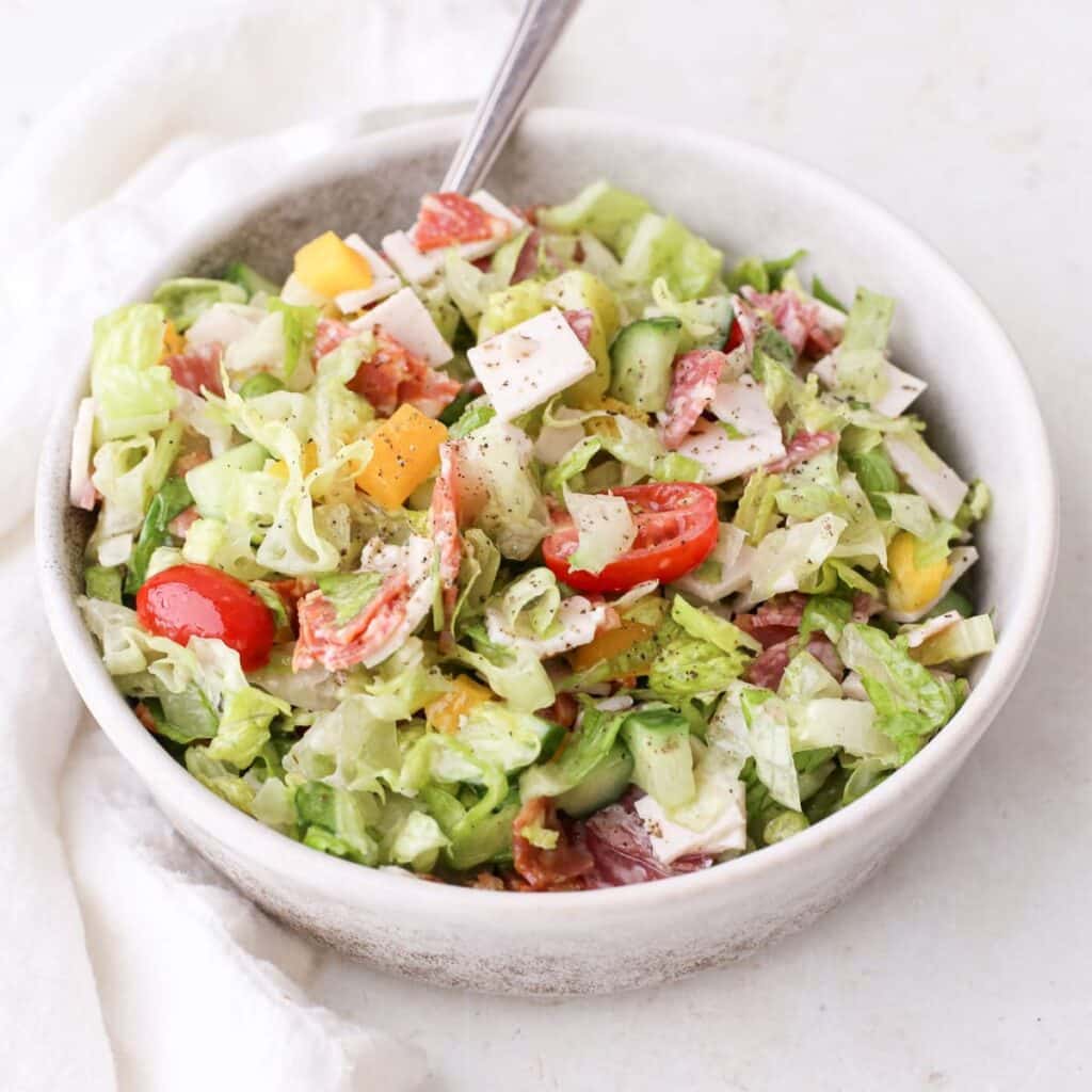 Chopped Italian grinder salad with tangy Italian grinder dressing.